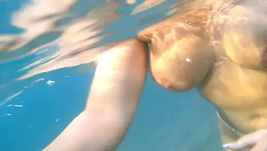 Luna sucks her mouthpiece underwater before getting fucked