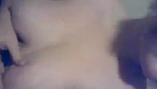 Chubby girl plays with her big tits