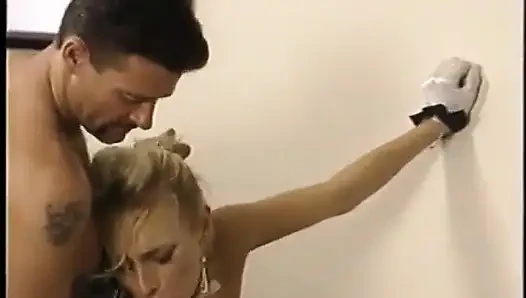 Hot blonde with perky tits in maid outfit sucks and takes two cocks