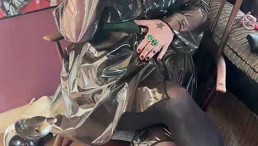 PVC Clad In Her See Through Coat Miss Tina Snua Smokes A Cigarette For You