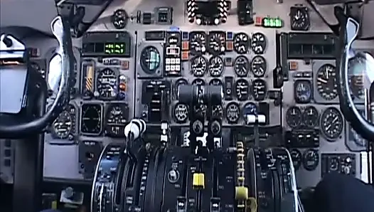 Randy pilot fondles sexy brunette in the cockpit