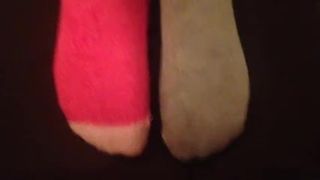 Cumming on pink and grey socks