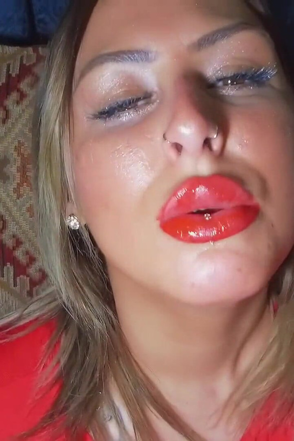 Smoking British chav with red lipstick
