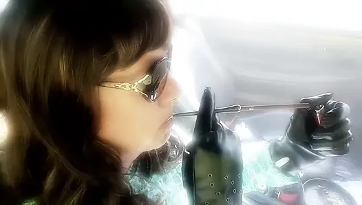 MATURE BRUNETTE MRS. ROMAN CAR SMOKING HER MORE 120 MENTHOLS IN HER BLACK CIGARETTE HOLDER