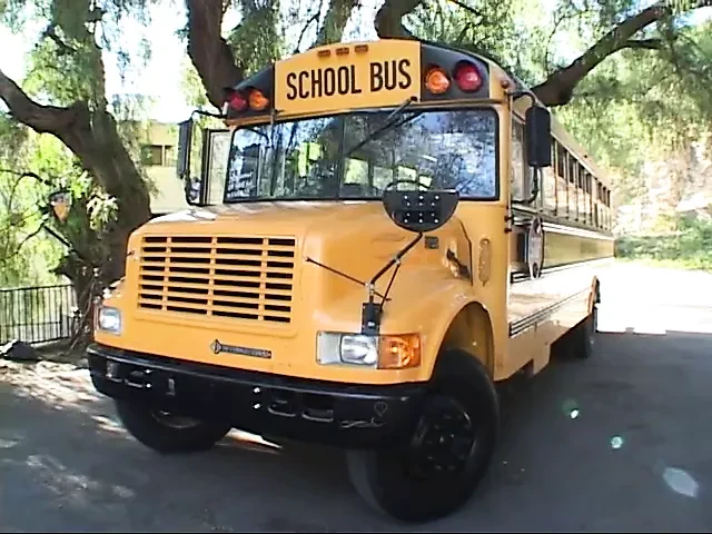 Blond chick gets banged from behind on her school bus