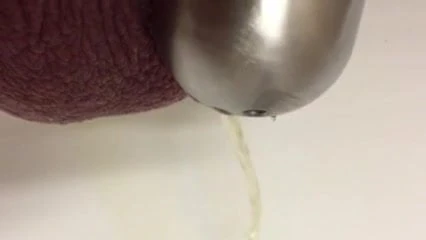 My slave piss with chastity at work