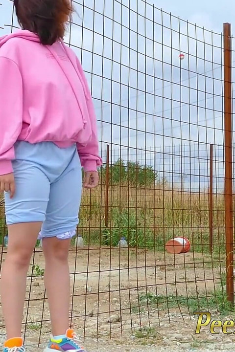 Desperate hipster girl trying hard to pee