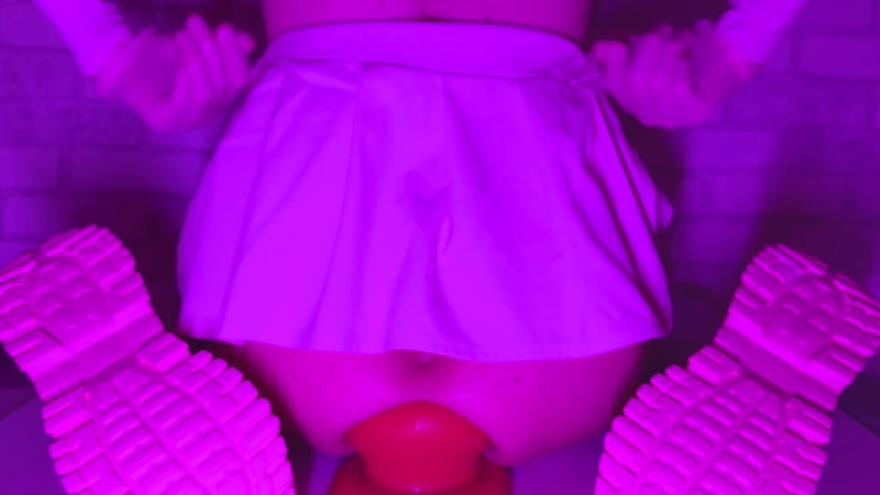 Sissy Girl In Short Skirt Bounces On a Huge 12-centimeter Thick Anal Plug