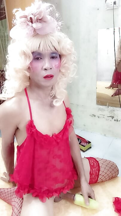 Oanh Le transgender wearing suggestive clothes to play with cans pretending to be too happy
