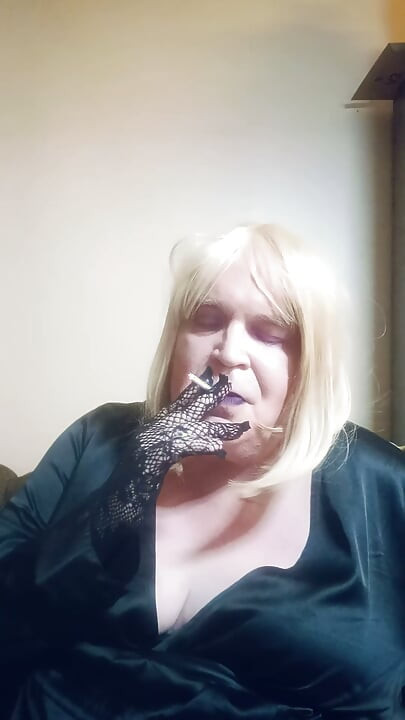 BBW TV smokes a superslim cigarette and tries on some gloves
