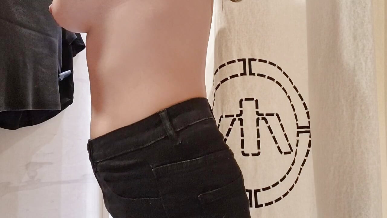 flashing tits in the fitting room with the curtain open