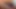 ソロのエボニーがバイブレーターで毛深い膣をマスターベーション