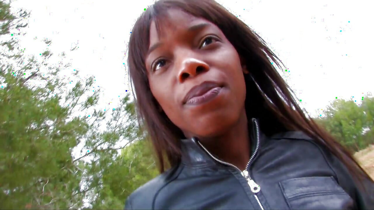 Ebony beauty is bouncing on the big dong outdoors