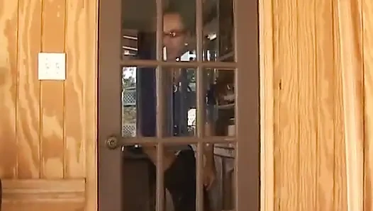 Guy grabs the blonde's tits as she's on her knees