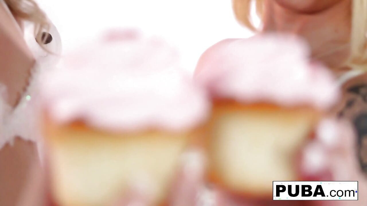 Elsa and Daisy play with some cupcakes and each other