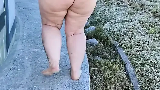 Curvy mom dancing in underwear outdoor