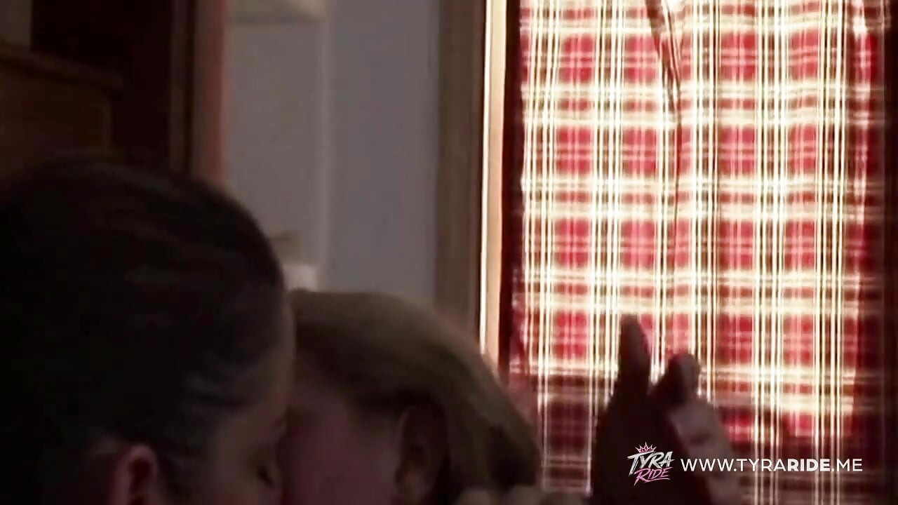 Blonde and Brunette Women Passionately Kissing and Licking