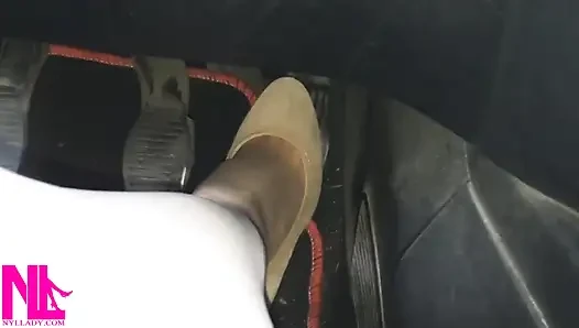 Driving Fast in Beige Pumps on Way to Airport