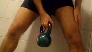 hanging 8kg weight from Penis