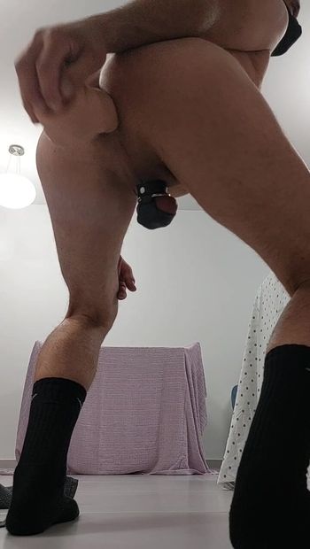 Fucking with a big dildo in black socks