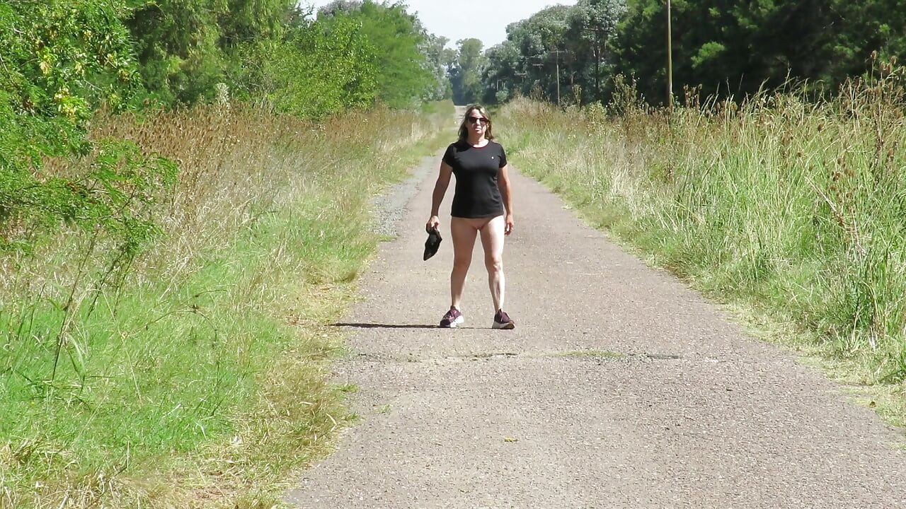 Patricia undresses under the summer sun