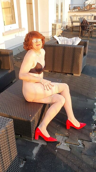 Naked on the roof terrace