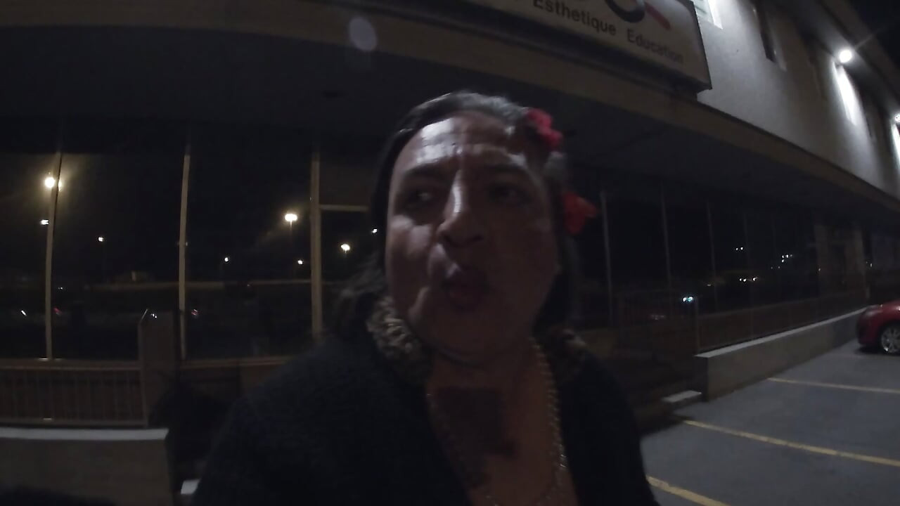 Midnight whore CD is walking around a car parking lot lookking to get lucky