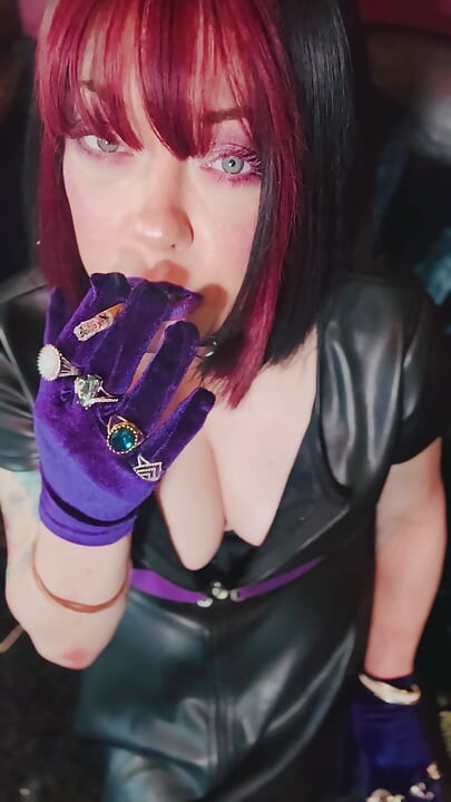 Queen Of Smoking Tina Snua Smoking A Cork Cigarette In Leather & Gloves