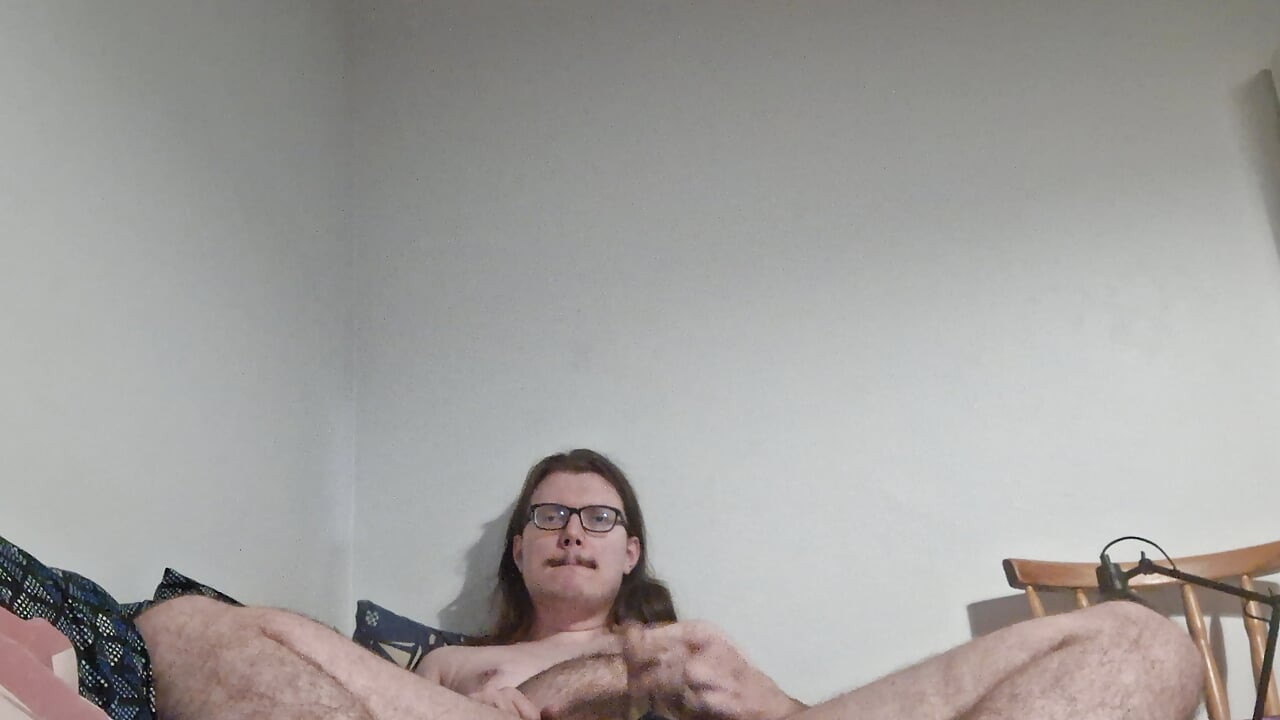 Young guy undresses, jerks off and shows feet