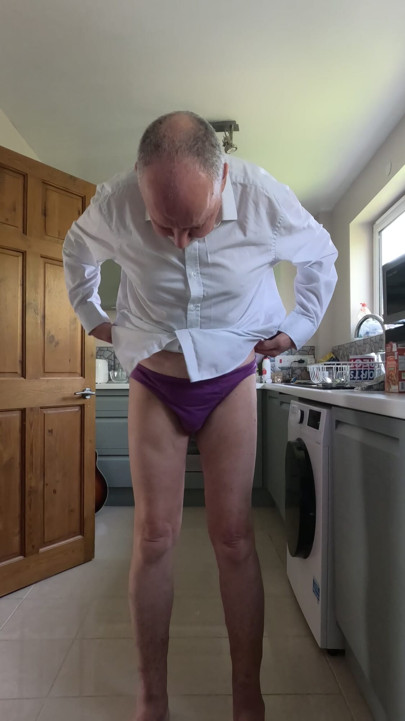 Stripping naked in the kitchen