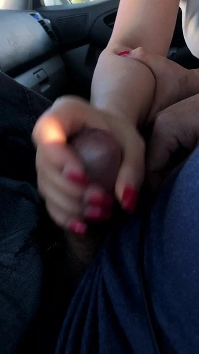 Wife teasing my cock in car.