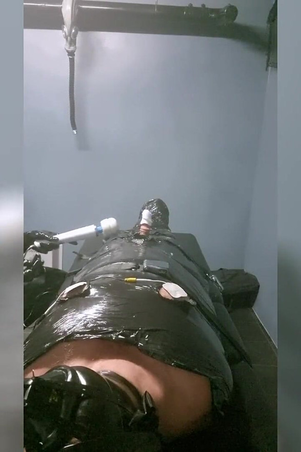 The Slave Suffers with a Breathing Mask During Hard Dilation.