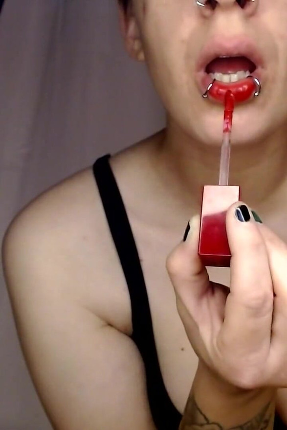 Thick Red Lipstick Application