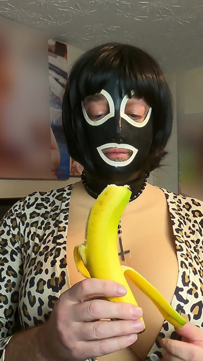 Gigantic Fake Tits Crossdresser Deepthroats a Banana