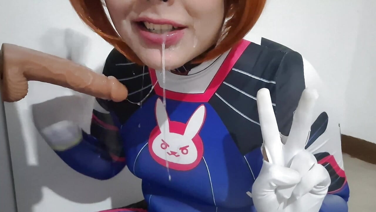 Femboy with Dva Cosplay and BDSM Nosehook Giving a Blowjob, Eating Cum and Deepthroat to Big Dildo