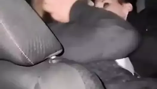 Lesbians making out in backseat