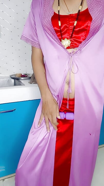 Indian stepmom wearing sexy satin blouse