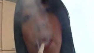Dom Brunette Blowing Smoke