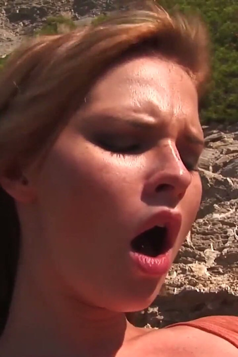 Mature Blonde MILF Pleasures Lover on Rocky Shore