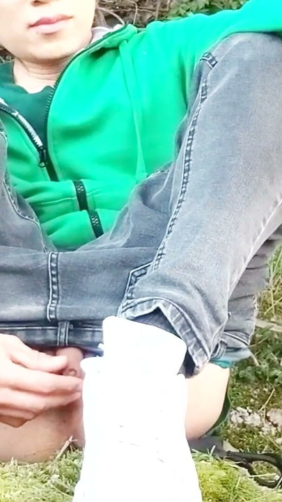 Risky masturbation outdoors a man's voice caught this cute gay twink with his balls hanging out, jerking off his uncut foreskin | Clip 1