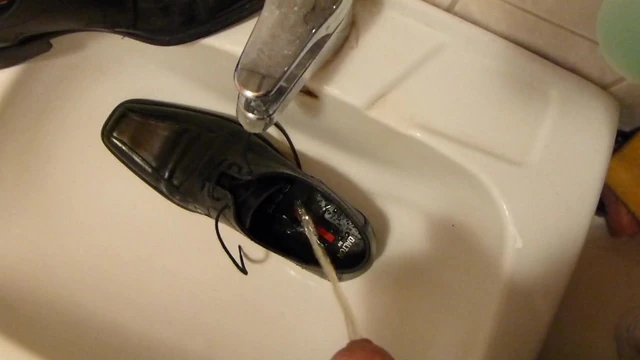 Piss in men's dress shoe