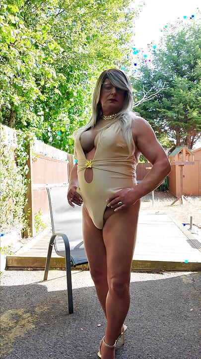 Sexy Crossdresser kellycd2022 in gold coloured swimsuit and heels