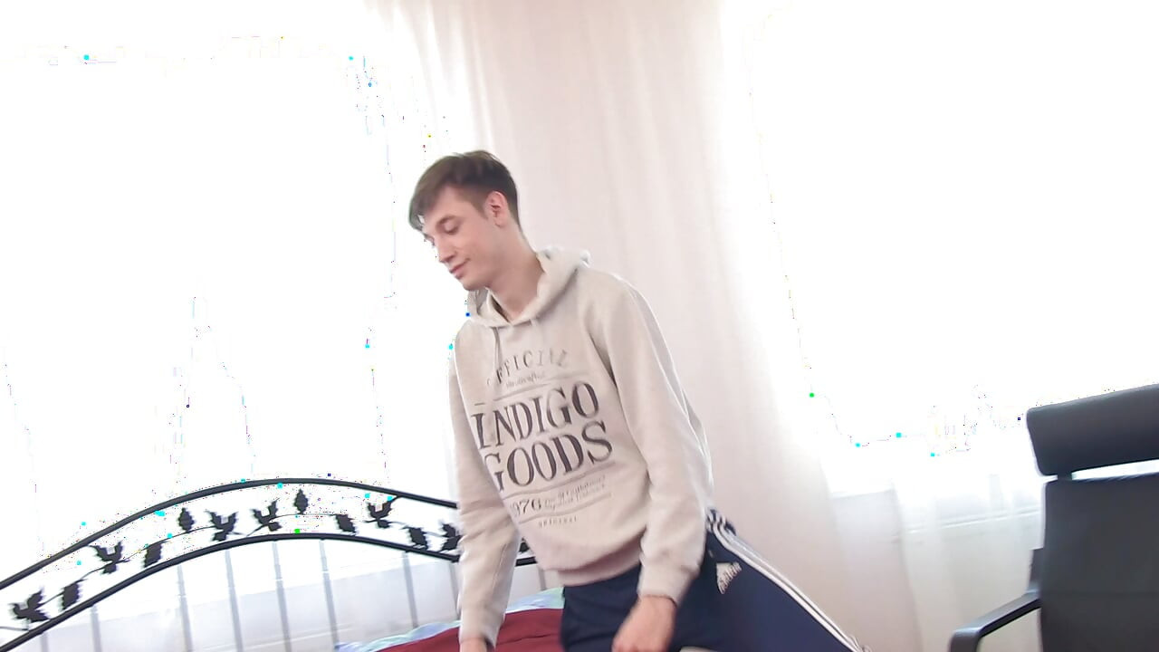 Handsome young man with a natural body and a big dick doing handjob