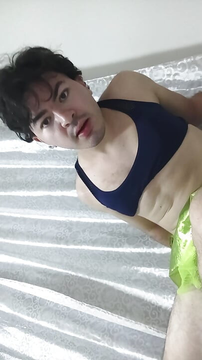 gay femboy sexy skirt lingerie and licking lollipop
