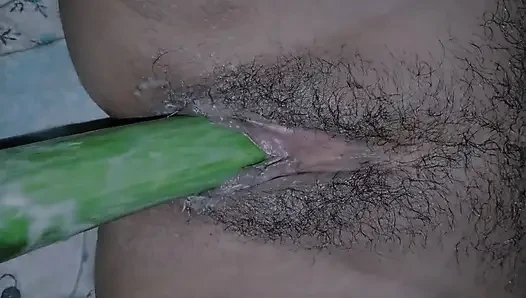 He put his hand in his wife's pussy and inserted the cucumber, the pussy and ass exploded.