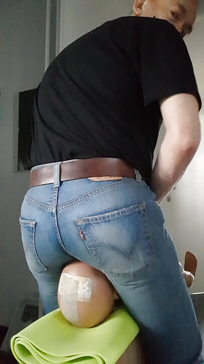 My jeans-butt riding the face of my sitting-doll