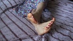 Red toenail foot tease
