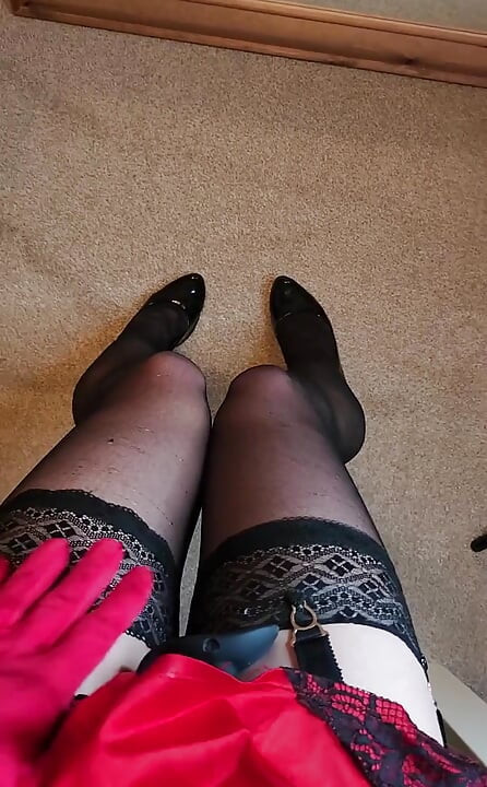 Horny whore in her black nylons and red satin baby doll 