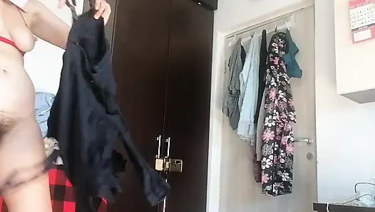 Sexy Latina Having Fun Trying on Clothes and Cutting Them