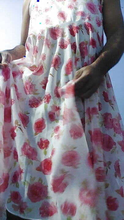 Shemale masterbate and cum wearing a silk seethrough fleard chiffon floral skirt